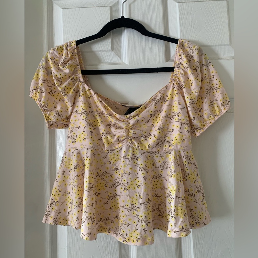 Babydoll top perfect for Springtime wardrobe.